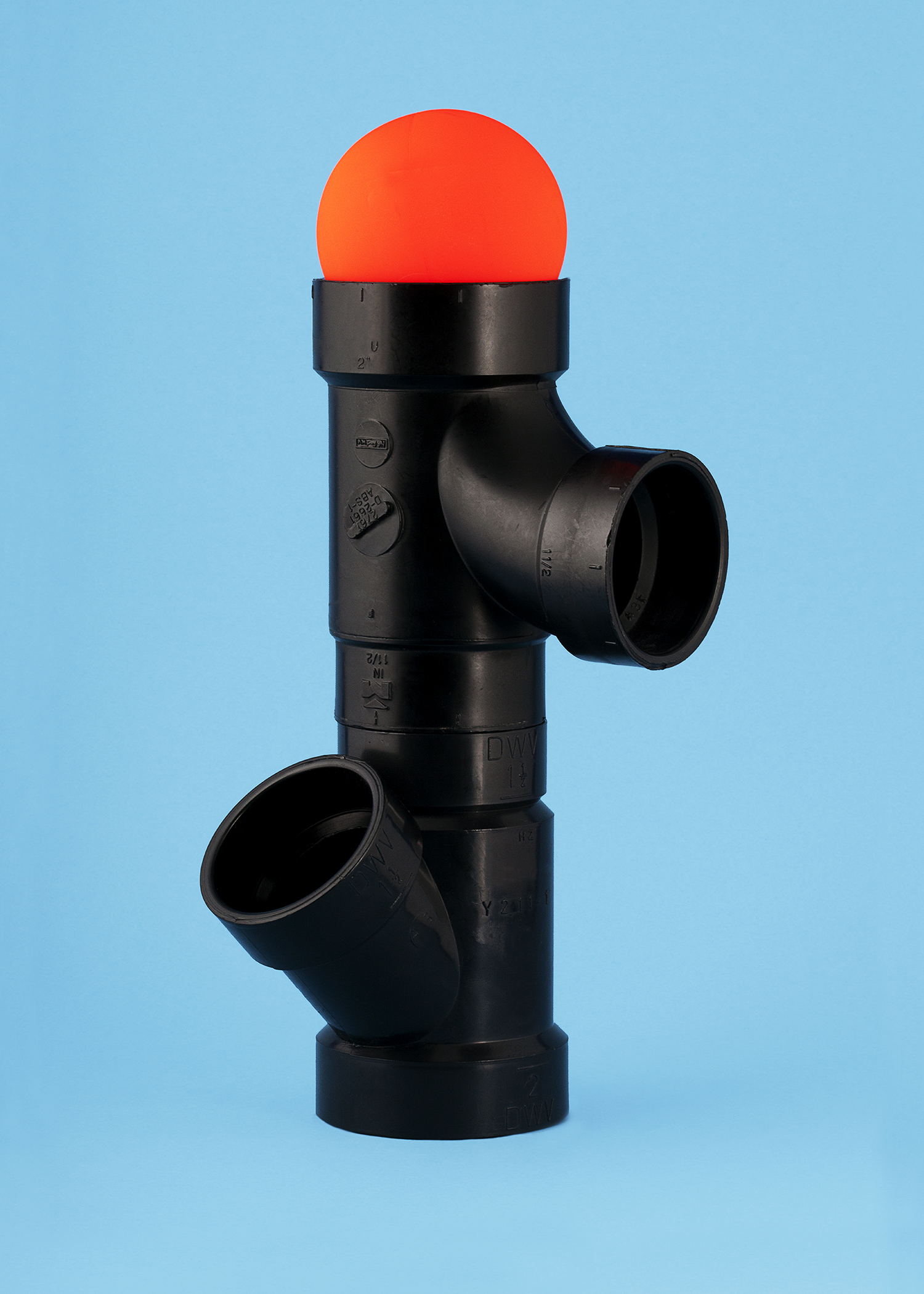 Jimmy Limit: Pipes with Orange Ball (Assemblage, Balance, Collapse, Cooperation, Drainage, Fragility, Isolation, Level, Loneliness, Masculinity, Nobody), 2013. 