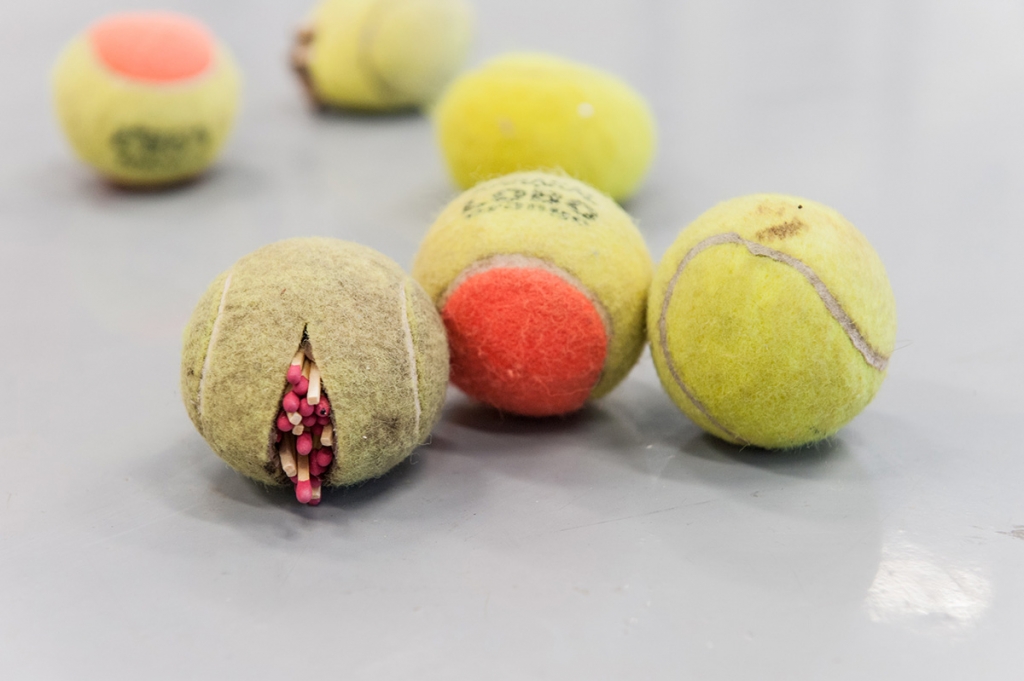 Claire Fontaine: Untitled (Tennis ball sculpture, 2008), installation view at Onsite [at] OCAD University, Toronto.