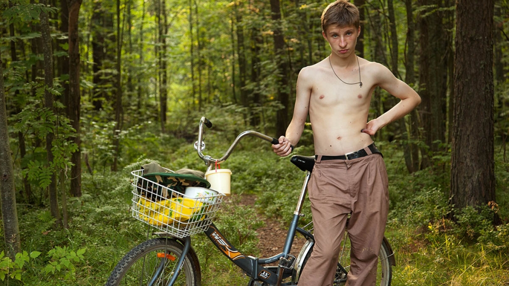Adad Hannah: Cyclist Stopped on a Path, from the series The Russians (2011). HD video; 5 min, 9 sec. Image courtesy Pierre-François Ouellette art contemporain, Montreal and Equinox Gallery, Vancouver.